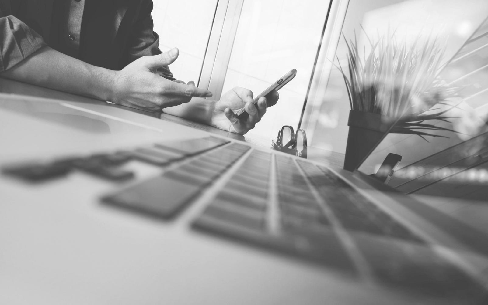 Student working on web interface design project at modern workstation